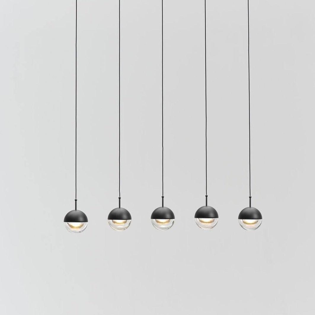 Zaneth minimalistisk pendellampe i stål og glas med flere ophæng til trappe