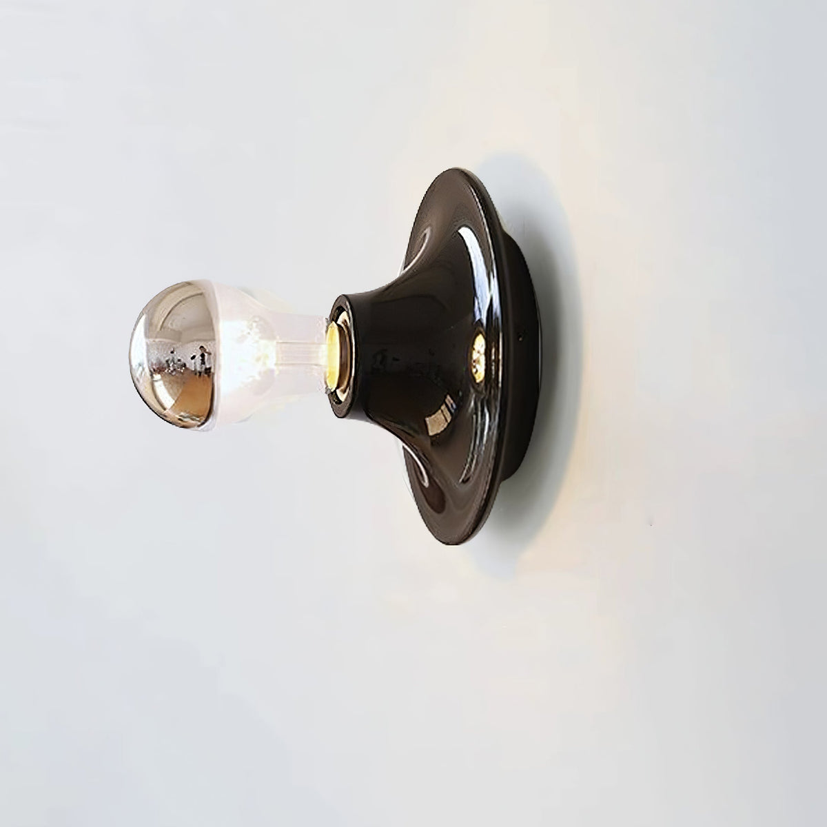 Ortheenin moderni minimalistinen lasiseinävalaisin