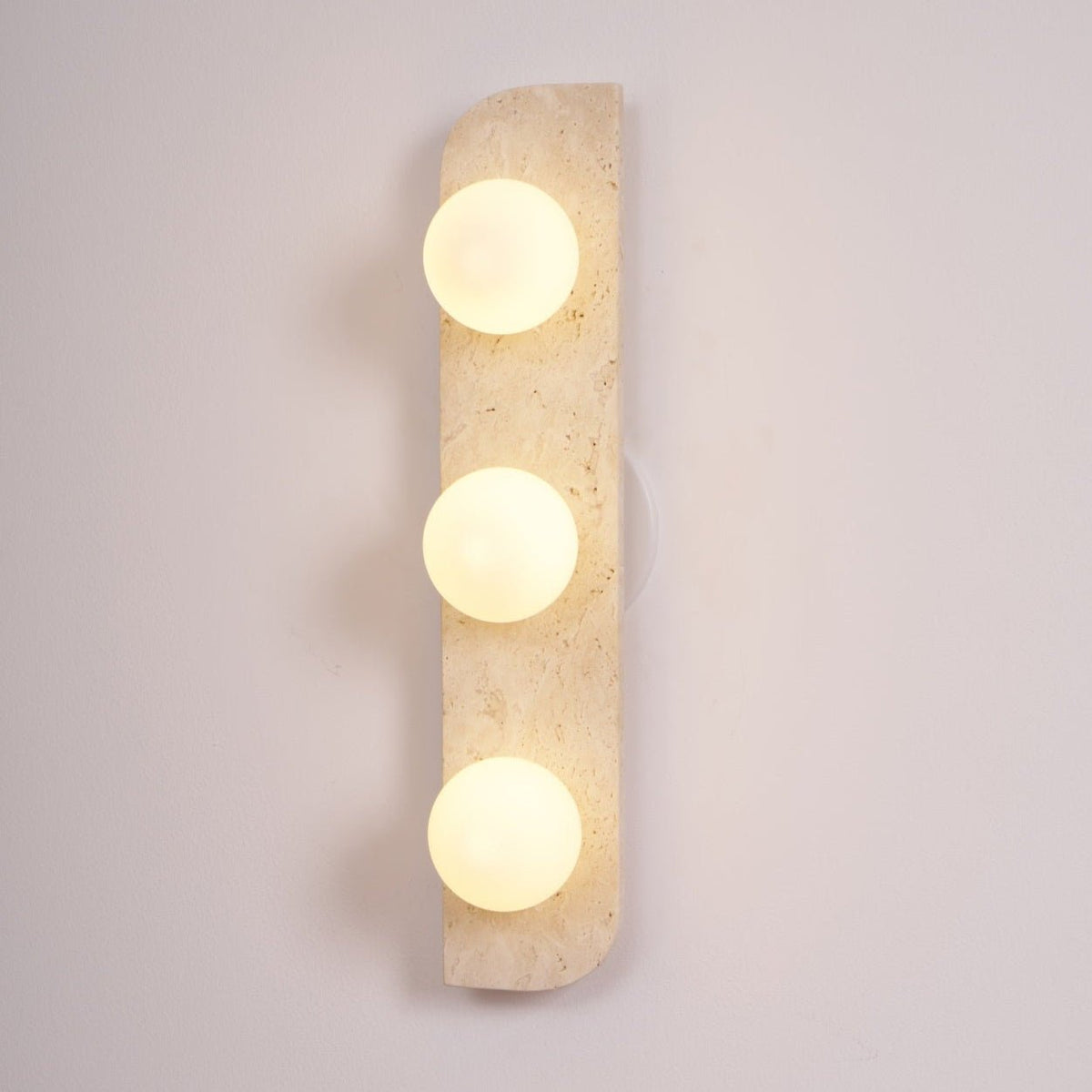 Taviniella minimalistisk vägglampa i travertin