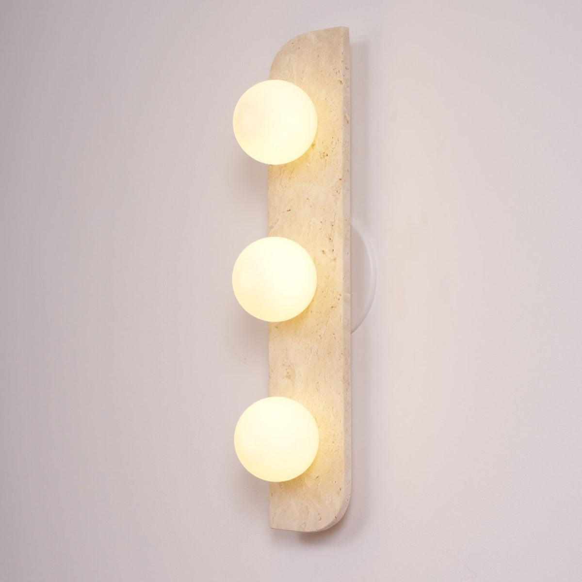 Taviniella minimalistisk vägglampa i travertin