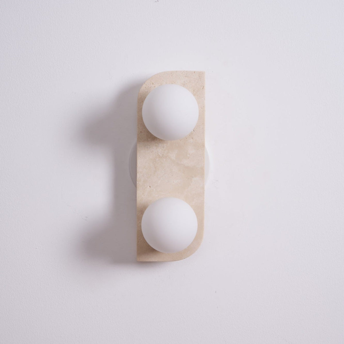 Taviniella minimalistisk vägglampa i travertin