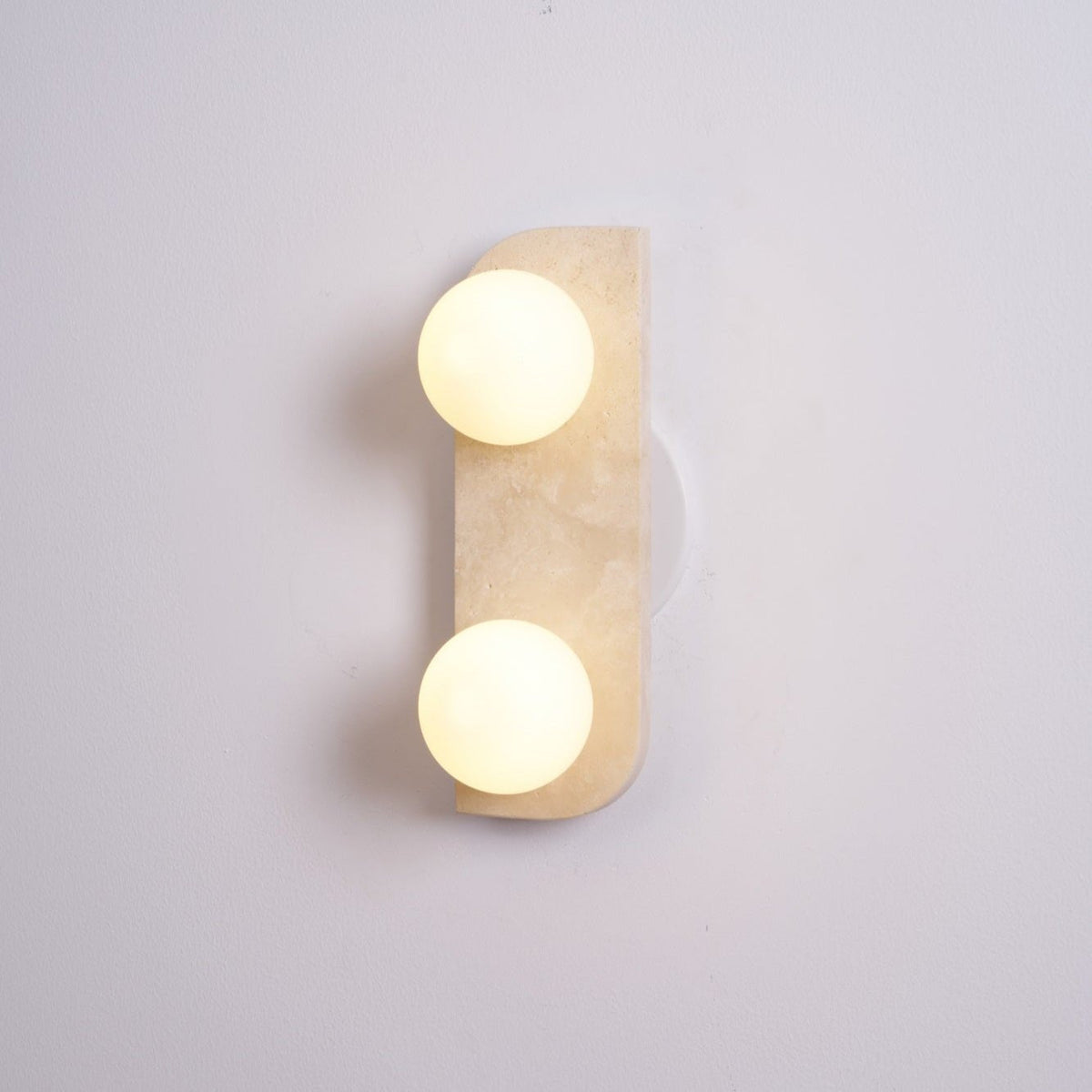 Taviniella minimalistisk vägglampa i travertin