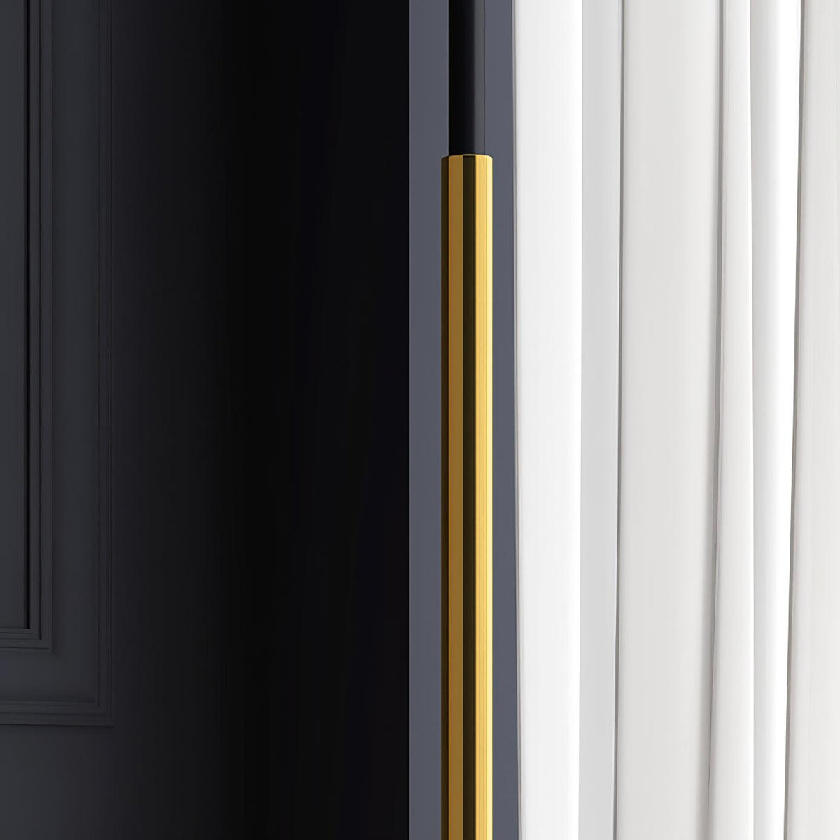 Xildas minimalistisk gulvlampe i sort og guld