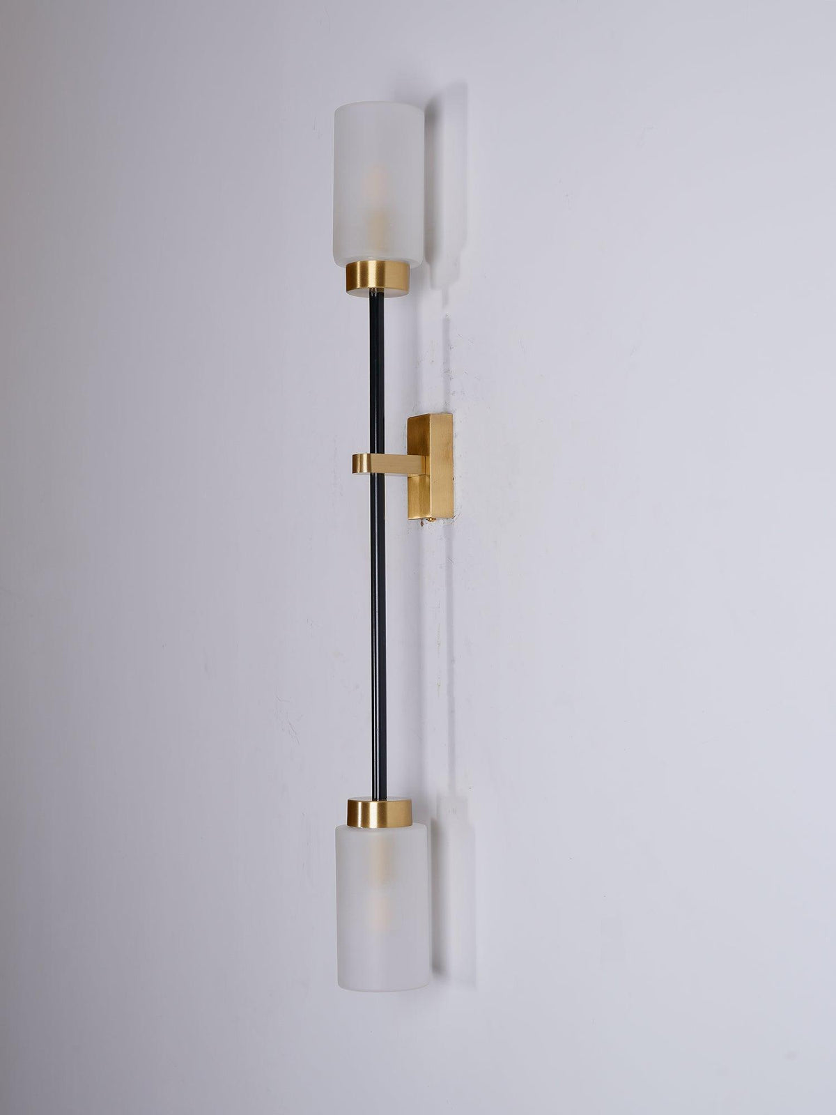 Tekas linjär vägglampa med cylindrar i glas