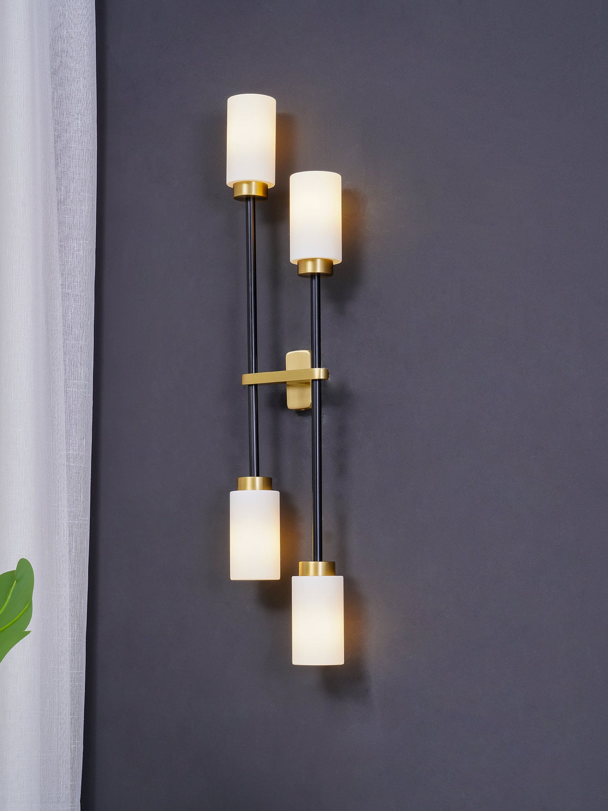 Tekas linjär vägglampa med cylindrar i glas