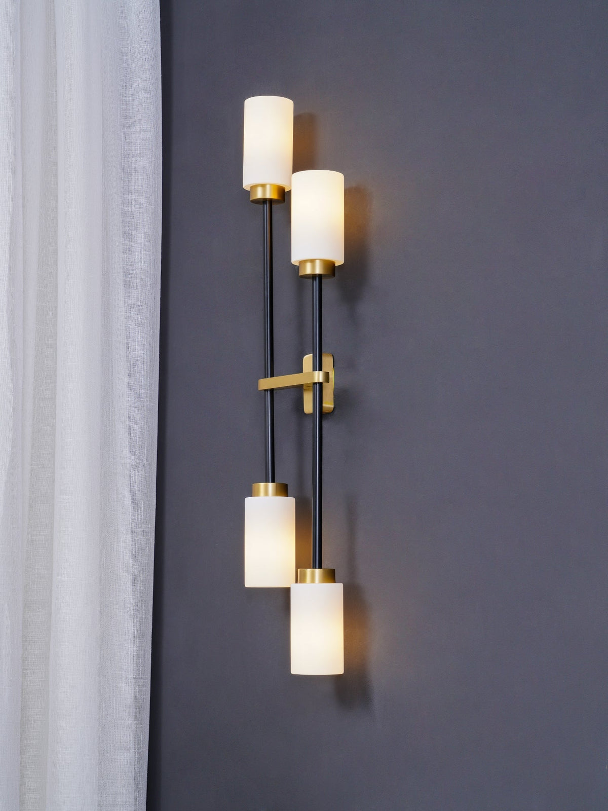 Tekas linjär vägglampa med cylindrar i glas