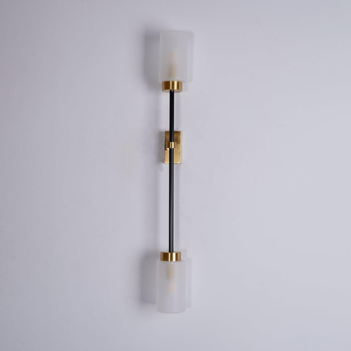Tekas linjär vägglampa med cylindrar i glas