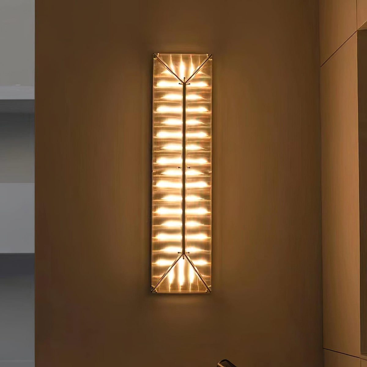 Moderne væglampe i glas med prismedesign