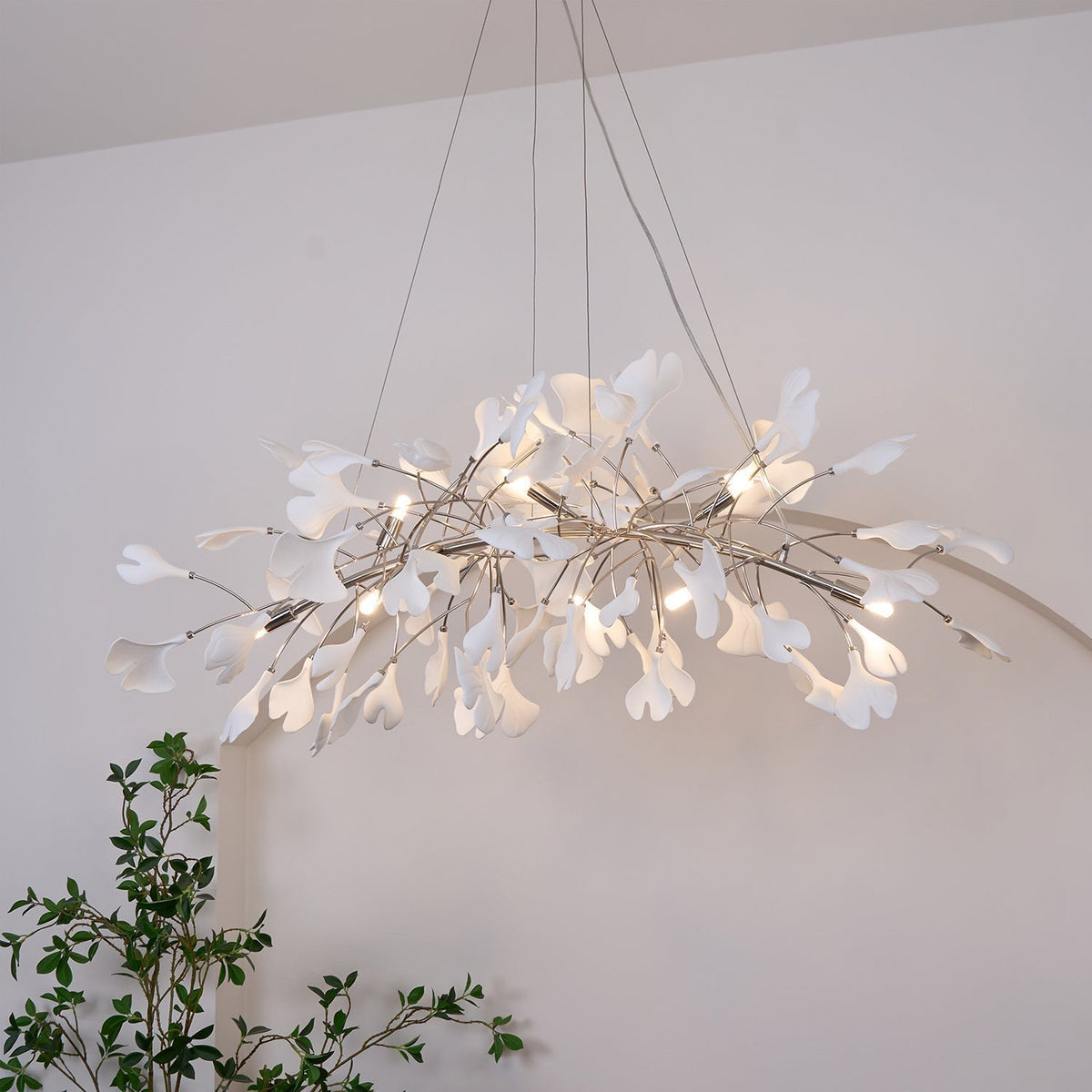 Aruxin art deco -tyylinen alaspäin kaartuva neidonhiuspuukattokruunu