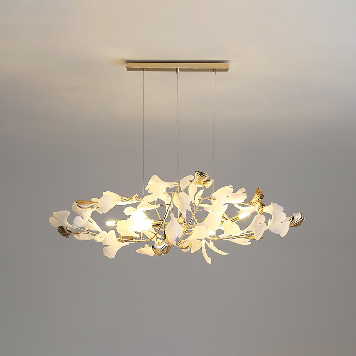 Candeeiro de teto elegante artístico Quiven, em cerâmica dourada com folha de ginkgo