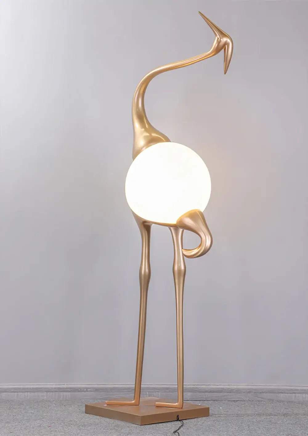 Vägglampa formad som en trana