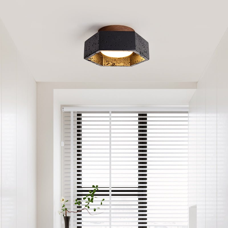 Hexara hexagonal taklampa i svart travertin