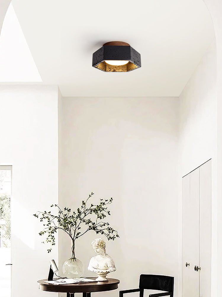 Hexara hexagonal taklampa i svart travertin