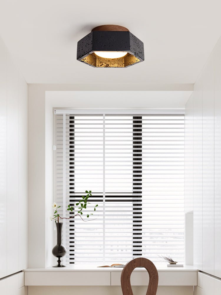 Hexara hexagonal taklampa i svart travertin