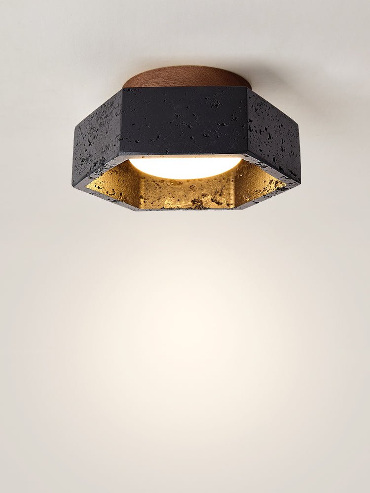 Hexara hexagonal taklampa i svart travertin