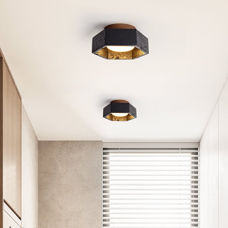 Hexara hexagonal taklampa i svart travertin