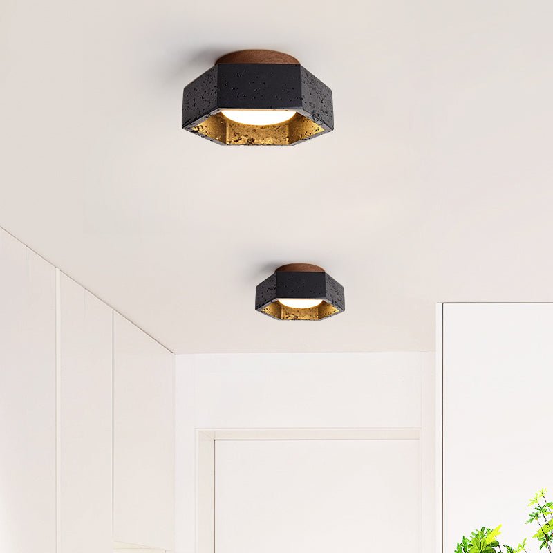 Hexara hexagonal taklampa i svart travertin