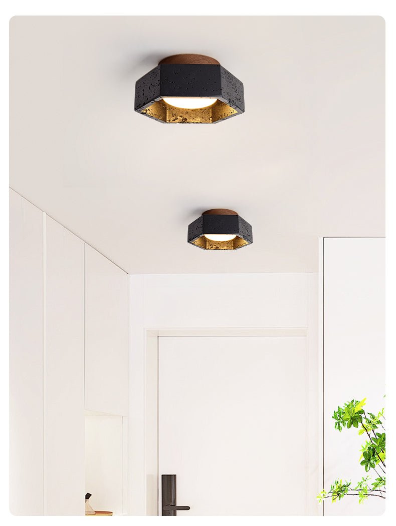 Hexara hexagonal taklampa i svart travertin