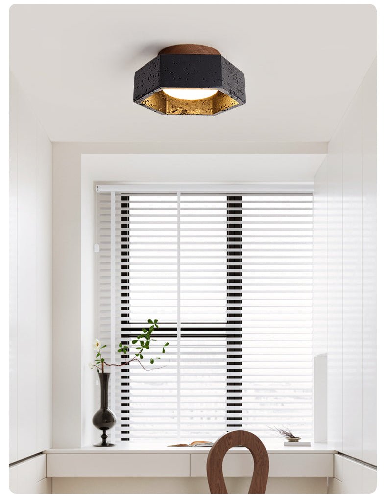 Hexara hexagonal taklampa i svart travertin