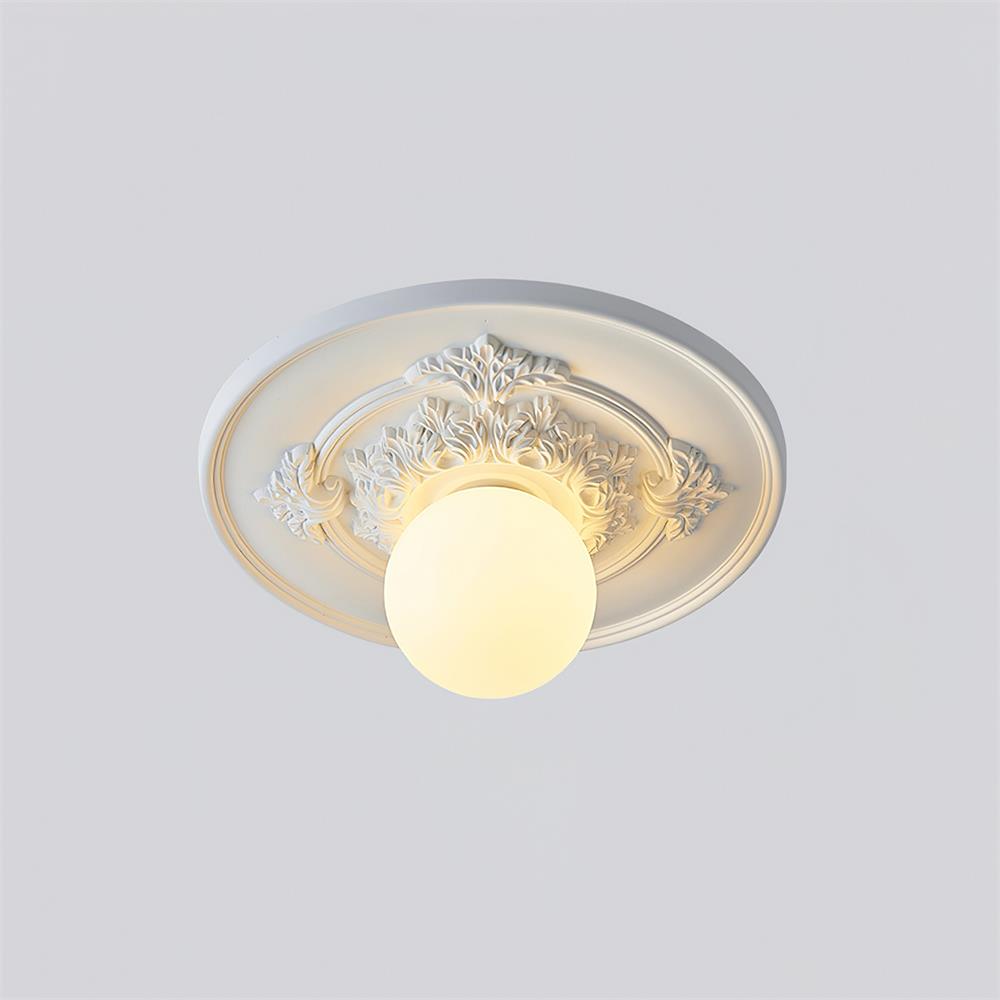 Elya vintage-taklampa med snidad design och globformad skärm