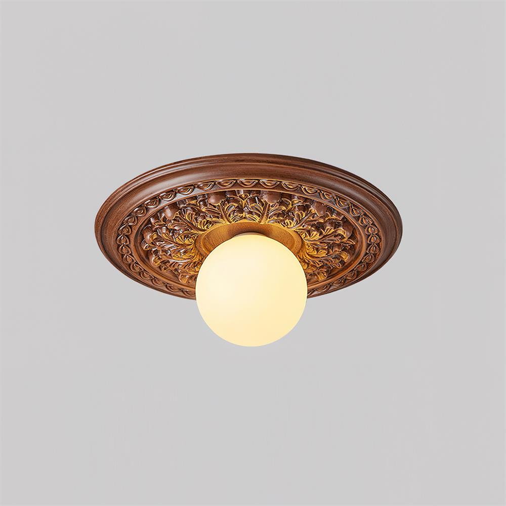 Elya vintage-taklampa med snidad design och globformad skärm