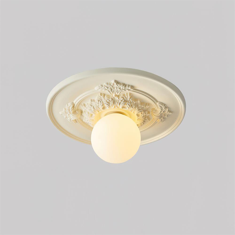 Elya vintage-taklampa med snidad design och globformad skärm