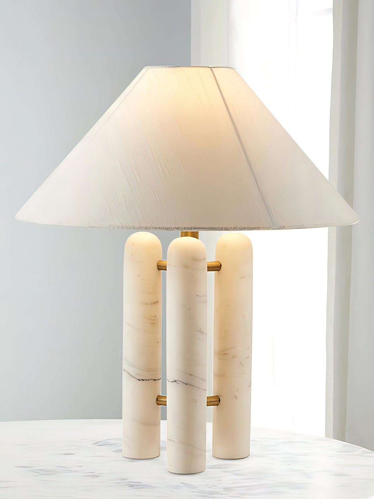 Trio moderne marmorbordlampe