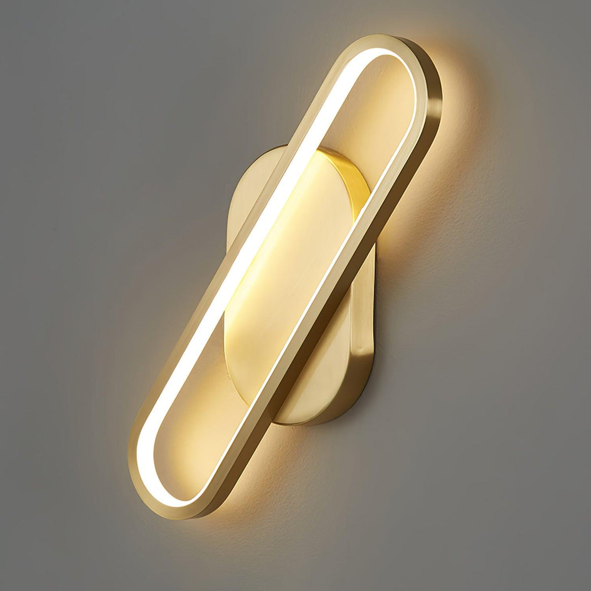 Candeeiro de parede Dhu clássico, comprido e oval, em latão