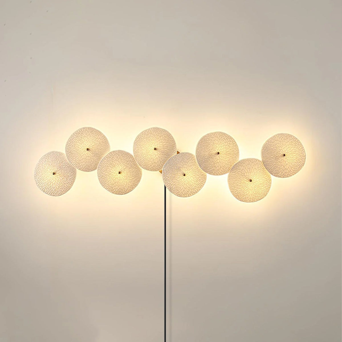Plug-in-vägglampa med lotusblad