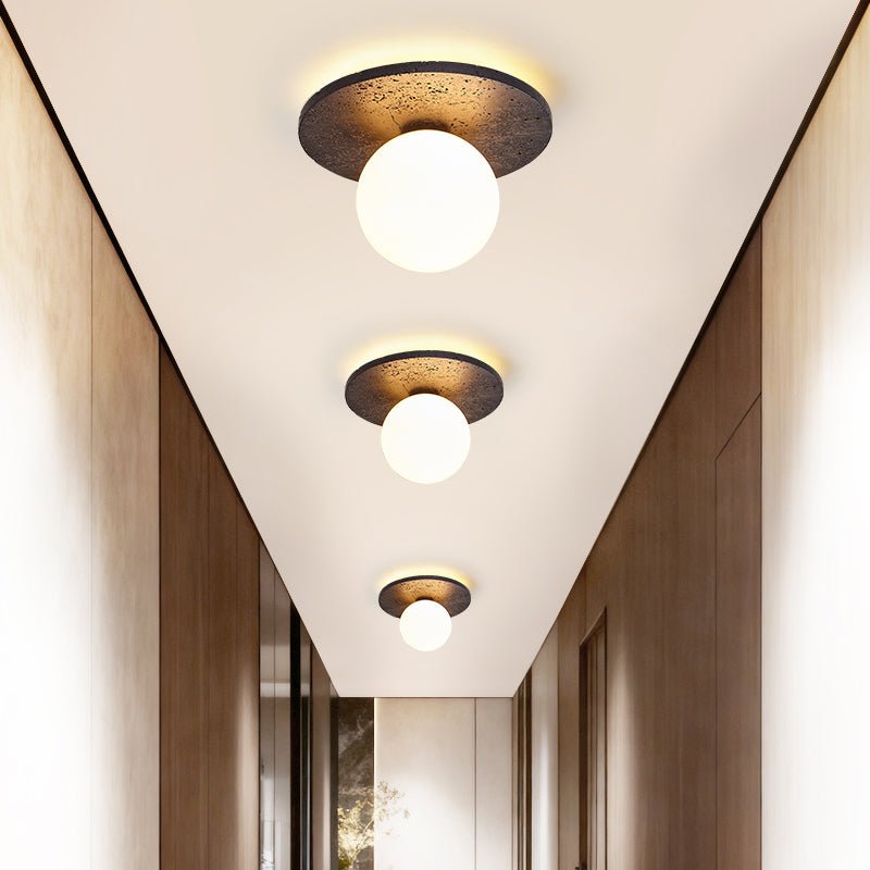 Otto globe-loftlampe i sort travertin