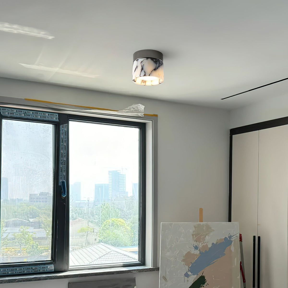 Selielle rund loftslampe i marmor
