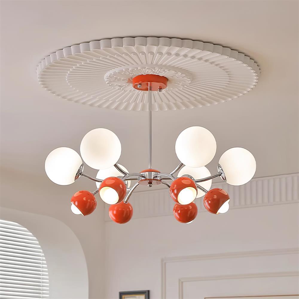 Eloria lysekrone med glaskuppel og kronbladsdesign, minimalistisk stemningsbelysning