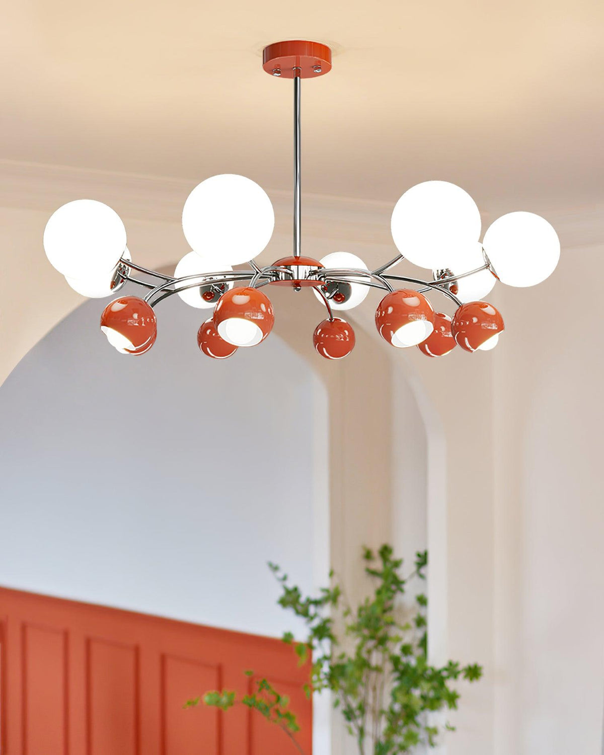 Eloria lysekrone med glaskuppel og kronbladsdesign, minimalistisk stemningsbelysning