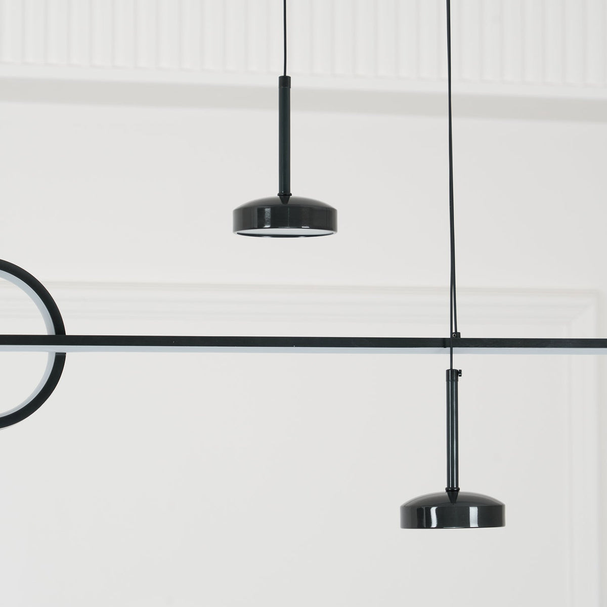 Tildas geometriske ringpendel minimalistisk