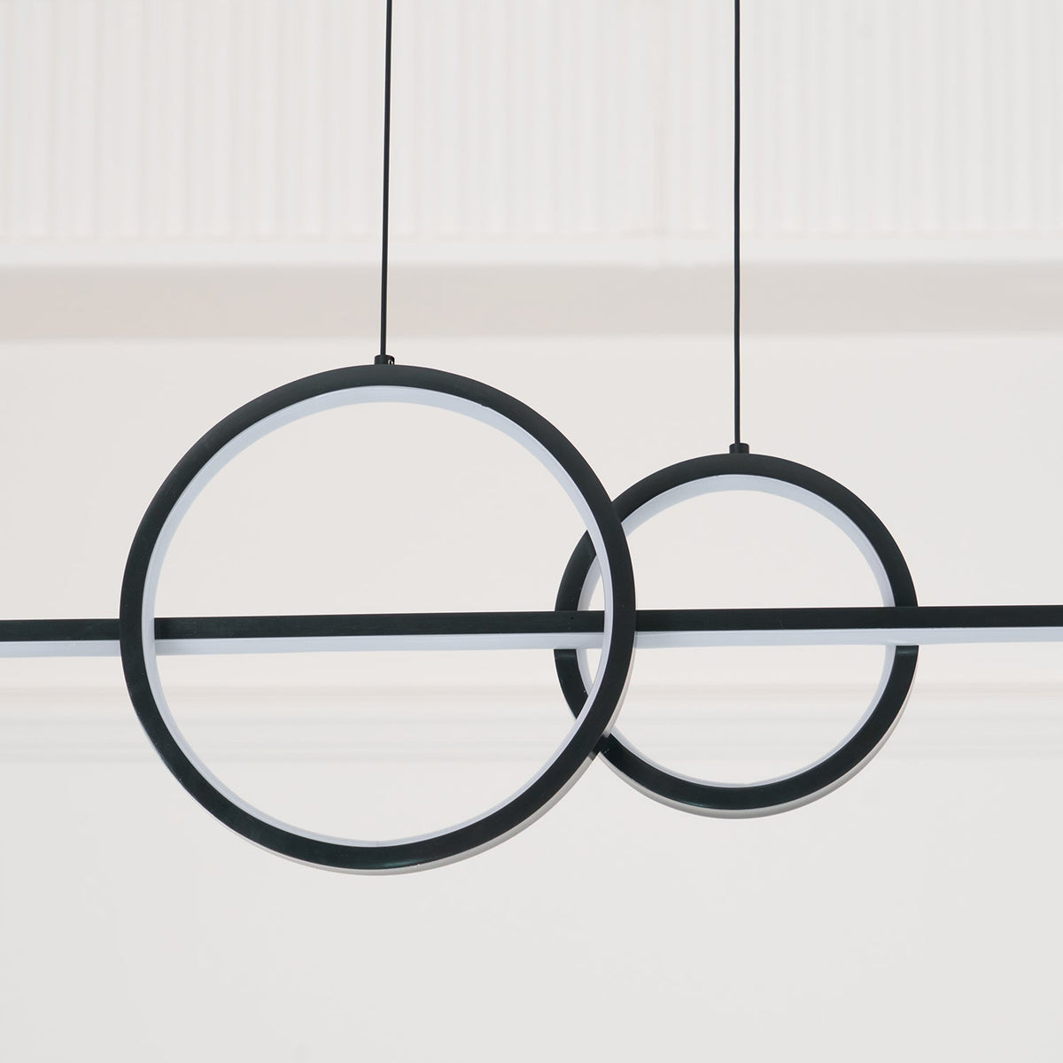 Tildas geometriske ringpendel minimalistisk