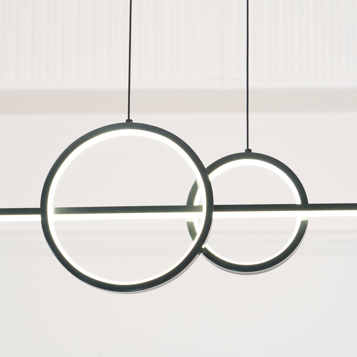 Tildas geometriske ringpendel minimalistisk
