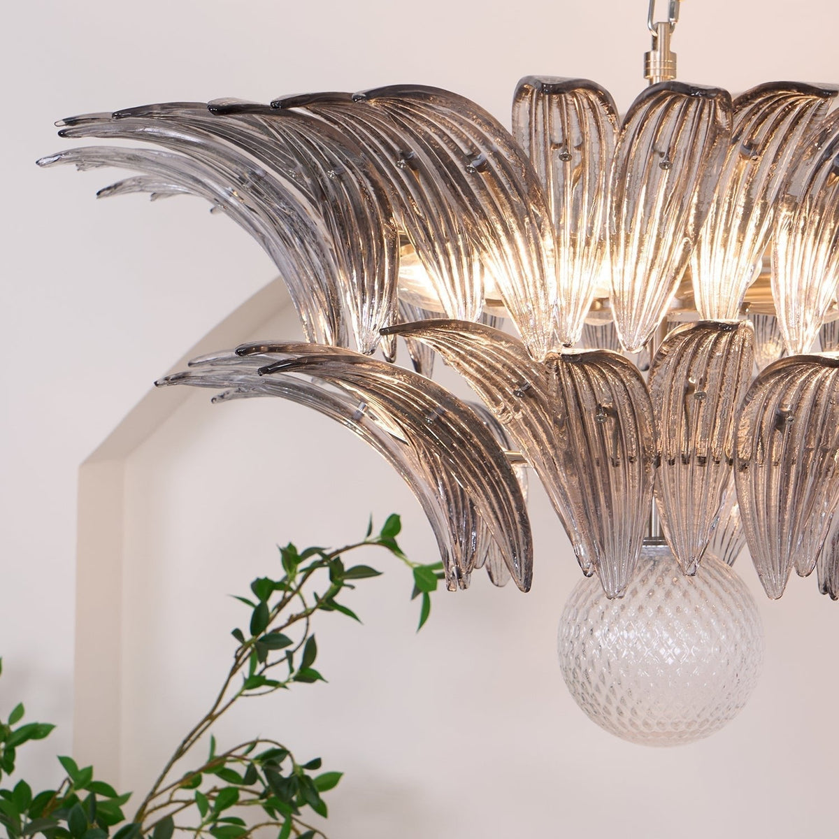 Candelabro Liororira com folha palmeta em vidro Murano transparente, em camadas