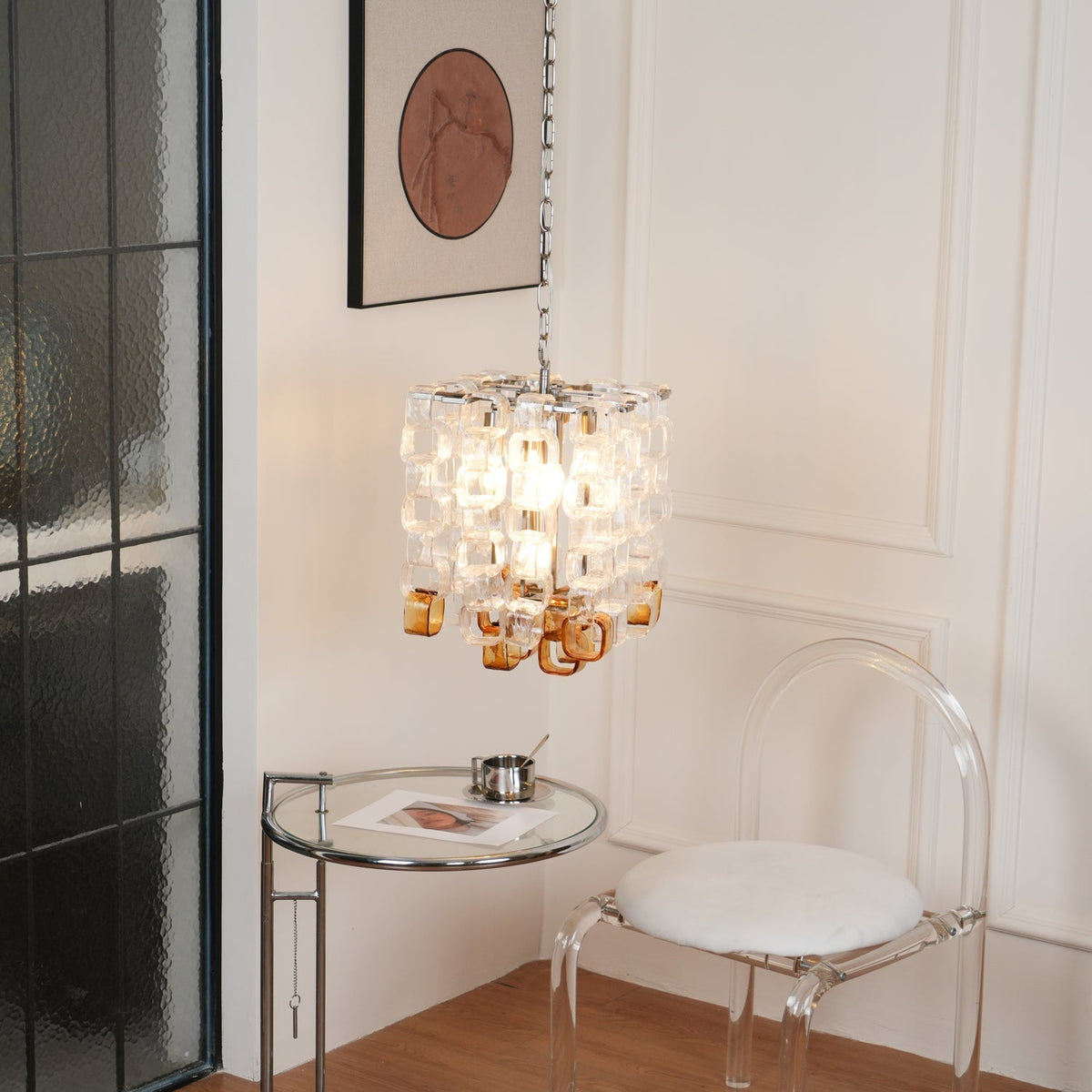 Orielis lysekrone i Murano-glas med sammenflettet geometrisk design