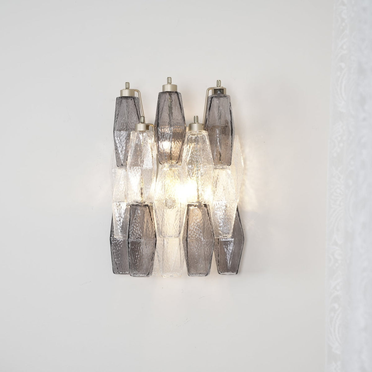 Eiruaria vägglampa rombformat glas i nivåer samtida