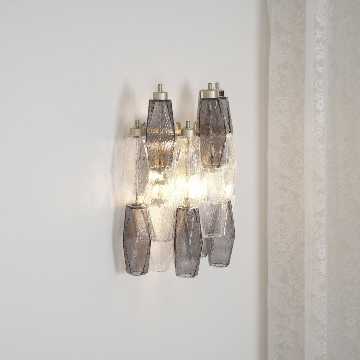 Eiruaria vägglampa rombformat glas i nivåer samtida