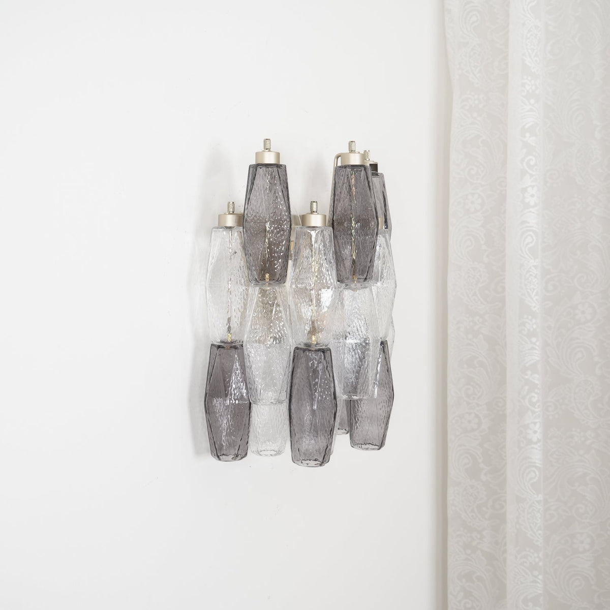 Eiruaria vägglampa rombformat glas i nivåer samtida