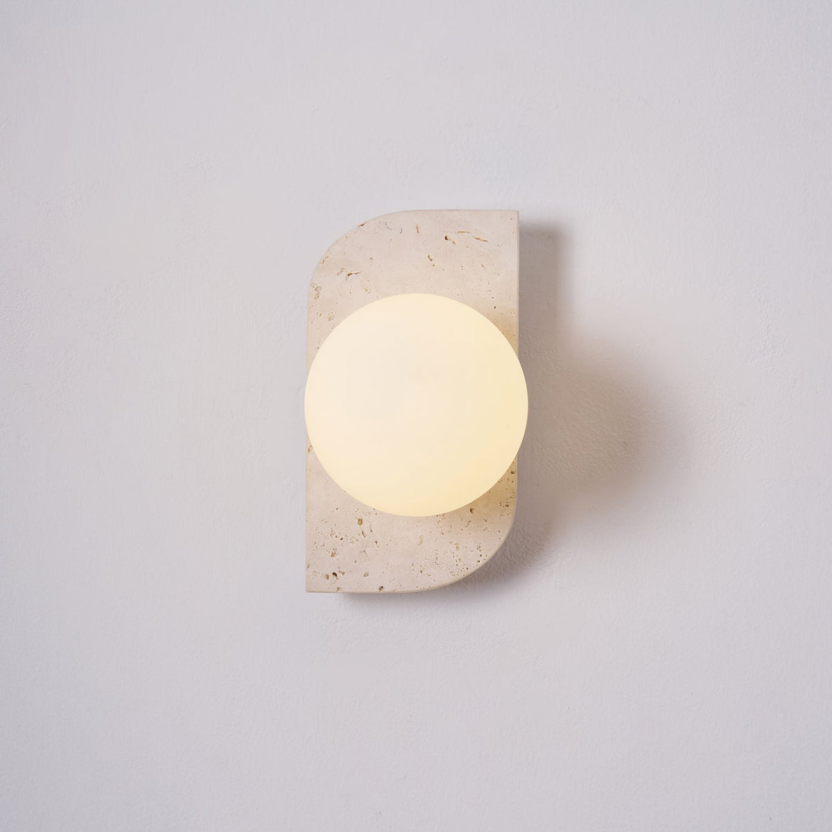 Taviniella minimalistisk vägglampa i travertin