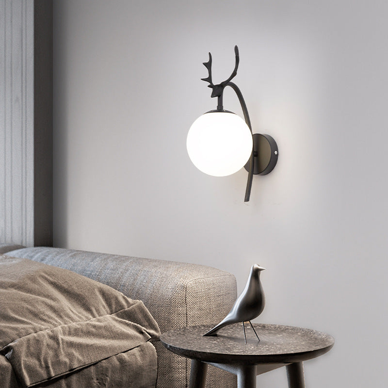 Valentina modern art déco-vägglampa med hjortmotiv för sängbord, svart/guld