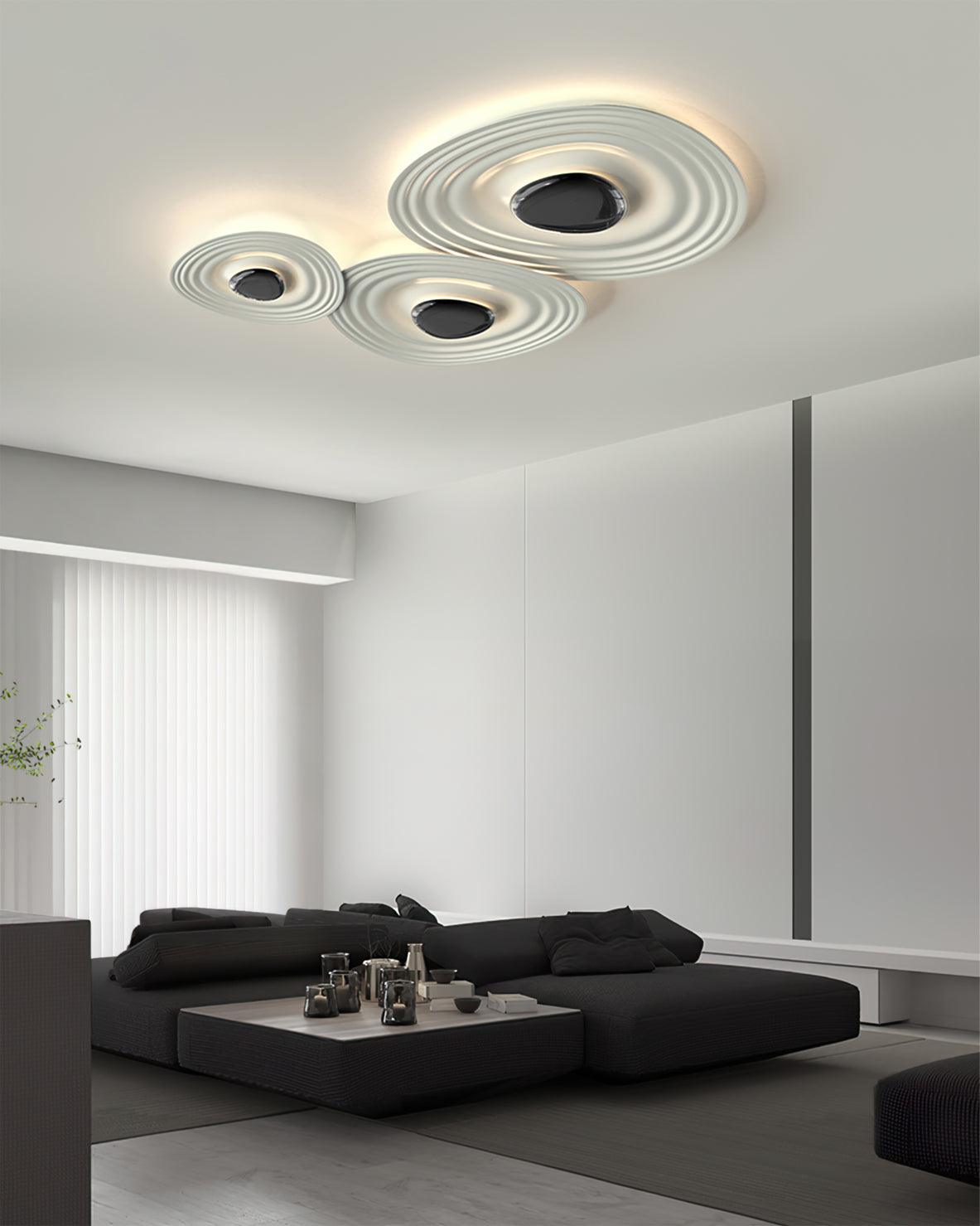 Idra modern skulptural taklampa med vågformad ring
