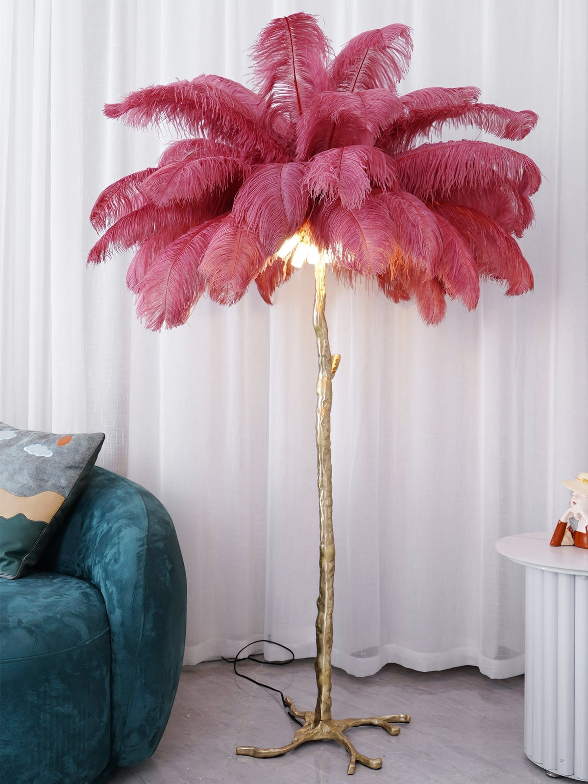 Selis golvlampa i mässing med fjäderdesign