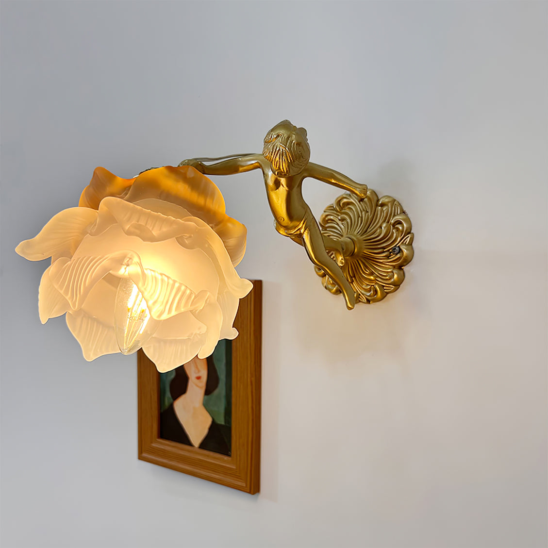 Arque rosafärgad vägglampa i glas