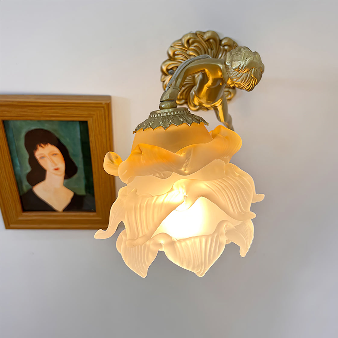 Arque rosafärgad vägglampa i glas