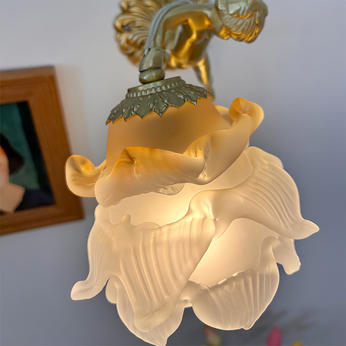 Arque rosafärgad vägglampa i glas