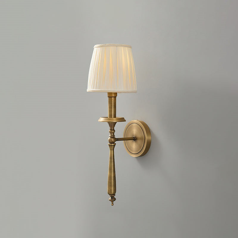 Oriisine vägglampa i mässing