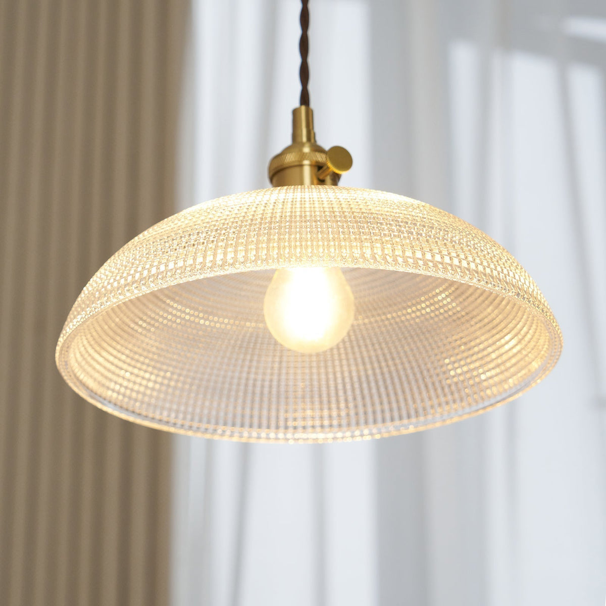 Crinel pendellampa i mässing och glas